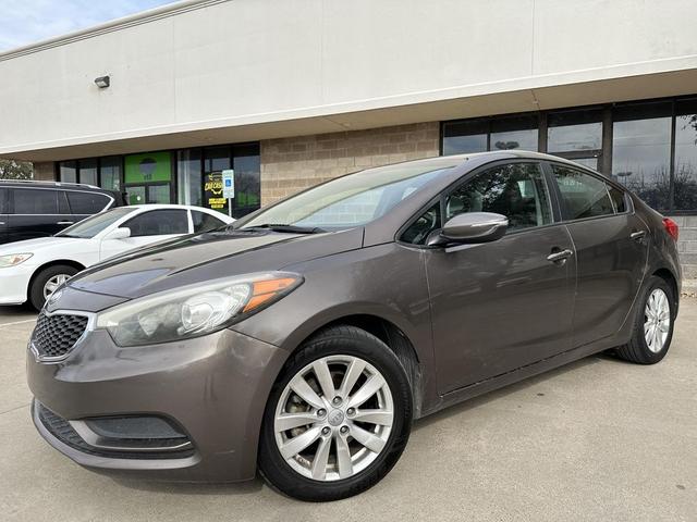 Photo of 2014 Metallic Bronze Kia Forte