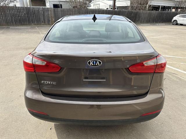 Photo of 2014 Metallic Bronze Kia Forte