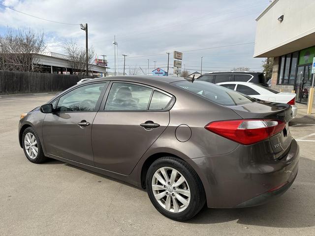 Photo of 2014 Metallic Bronze Kia Forte