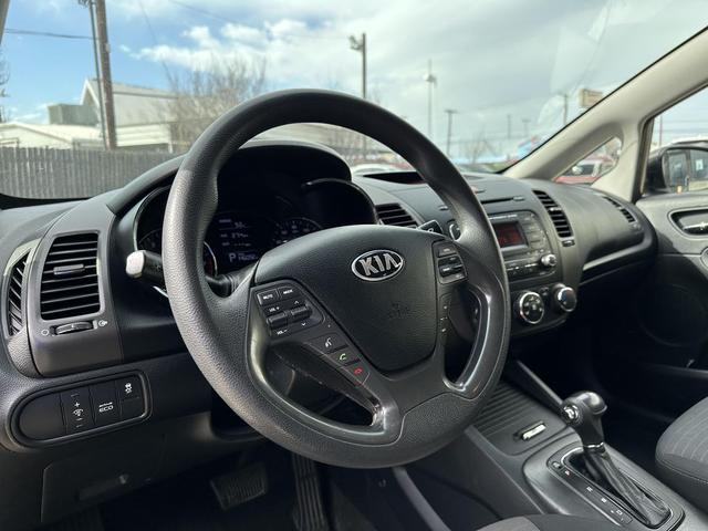 Photo of 2014 Metallic Bronze Kia Forte