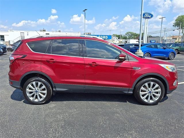 Photo of 2017 Ruby Red Metallic Tinted Clearcoat Ford Escape