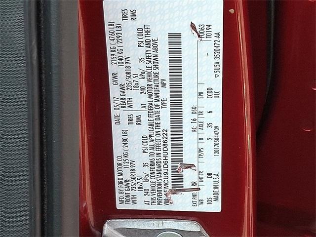 Photo of 2017 Ruby Red Metallic Tinted Clearcoat Ford Escape
