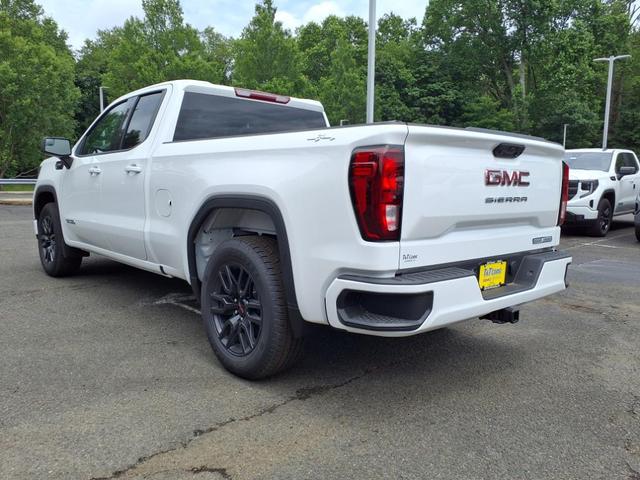 Photo of 2025 Summit White Gaz GMC Sierra 1500