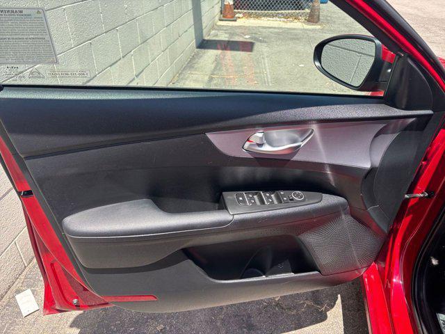 Photo of 2024 Currant Red Kia Forte