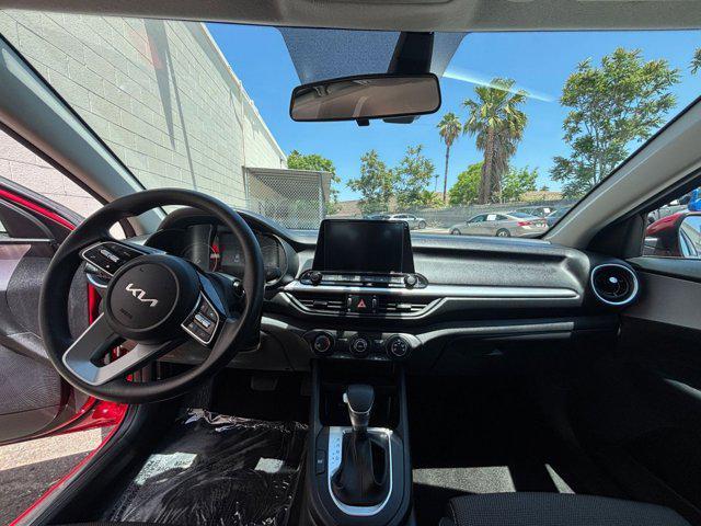 Photo of 2024 Currant Red Kia Forte