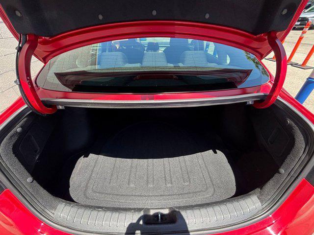 Photo of 2024 Currant Red Kia Forte