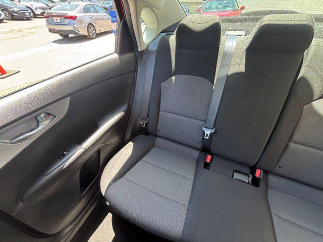 Photo of 2024 Currant Red Kia Forte