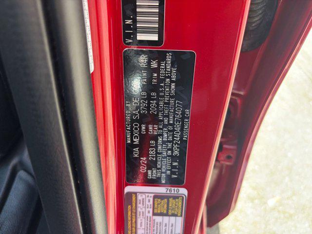 Photo of 2024 Currant Red Kia Forte