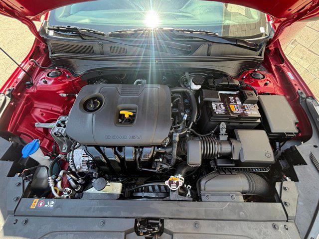 Photo of 2024 Currant Red Kia Forte