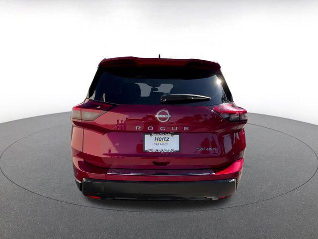 Photo of 2024 Scarlet Ember Tintcoat Nissan Rogue