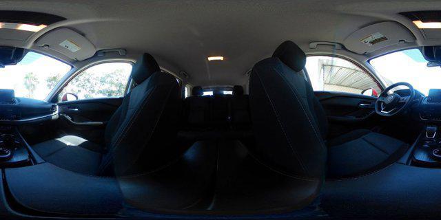 Photo of 2024 Scarlet Ember Tintcoat Nissan Rogue