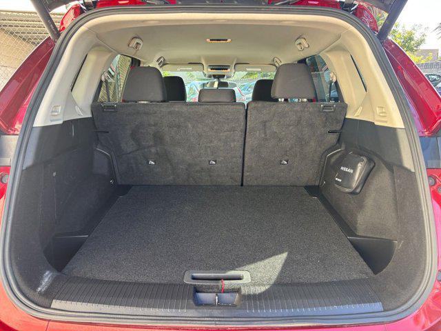 Photo of 2024 Scarlet Ember Tintcoat Nissan Rogue