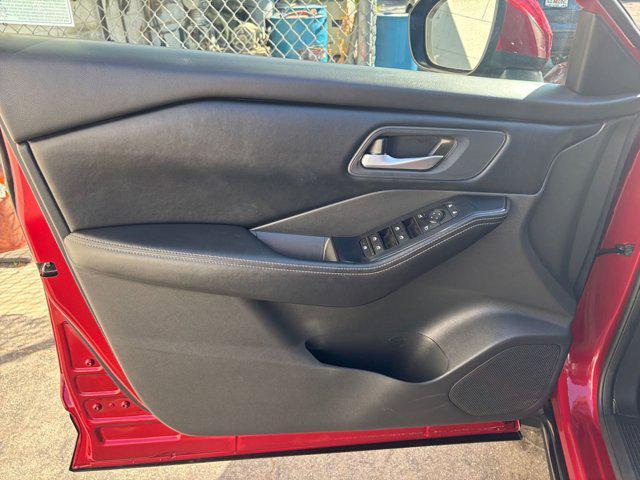 Photo of 2024 Scarlet Ember Tintcoat Nissan Rogue