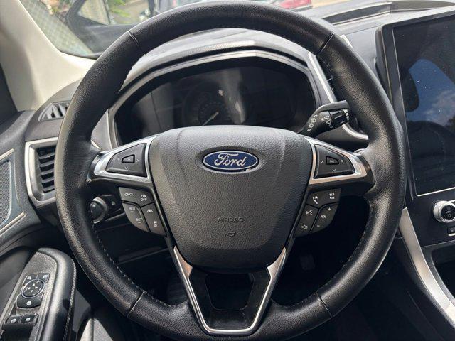 Photo of 2024 Atlas Blue Metallic Ford Edge