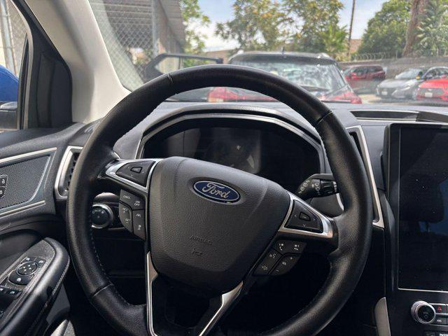 Photo of 2024 Atlas Blue Metallic Ford Edge