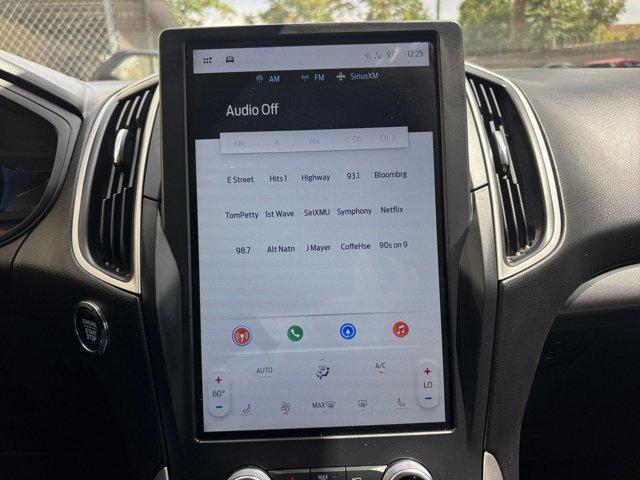 Photo of 2024 Atlas Blue Metallic Ford Edge