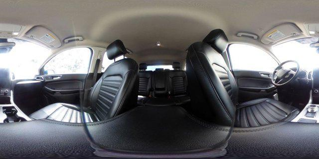 Photo of 2024 Atlas Blue Metallic Ford Edge