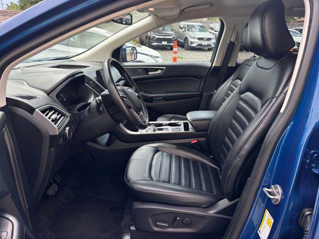 Photo of 2024 Atlas Blue Metallic Ford Edge