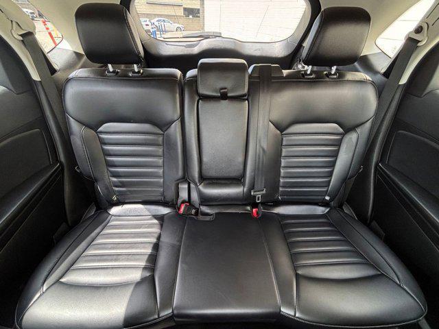 Photo of 2024 Atlas Blue Metallic Ford Edge