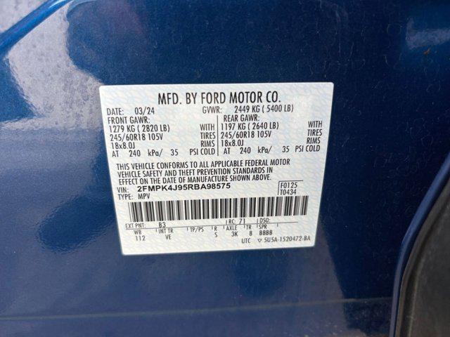 Photo of 2024 Atlas Blue Metallic Ford Edge