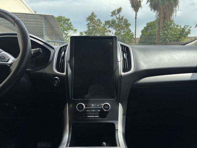 Photo of 2024 Atlas Blue Metallic Ford Edge