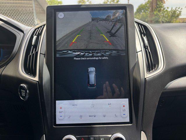 Photo of 2024 Atlas Blue Metallic Ford Edge