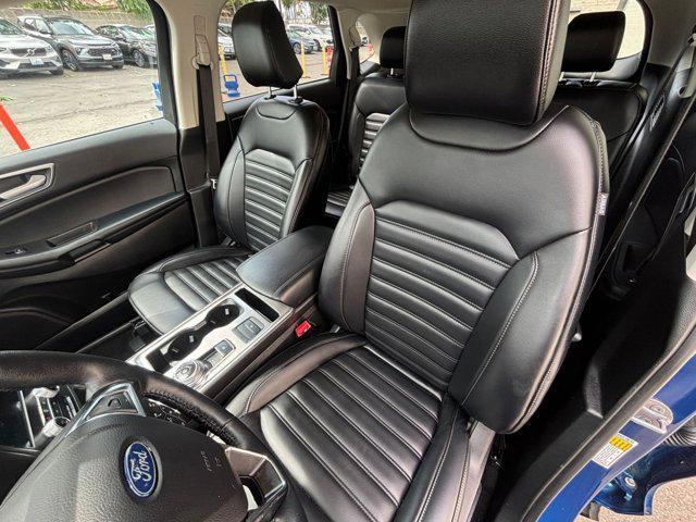 Photo of 2024 Atlas Blue Metallic Ford Edge