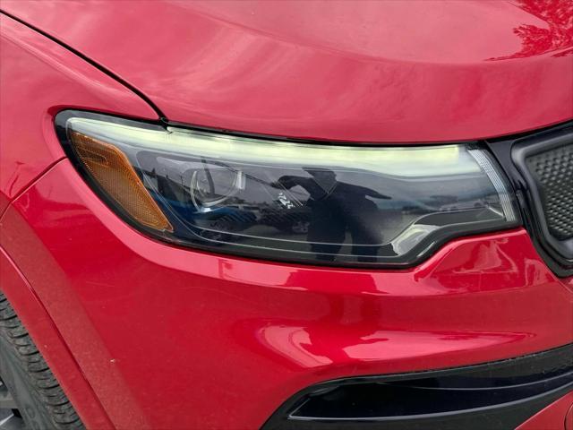Photo of 2022 Redline Pearlcoat Jeep Compass