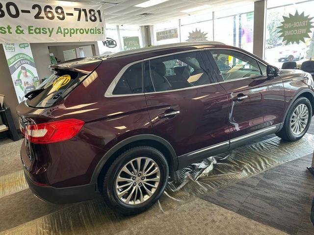 Photo of 2018 Burgundy Velvet Metallic Tinted Clearcoat Lincoln MKX
