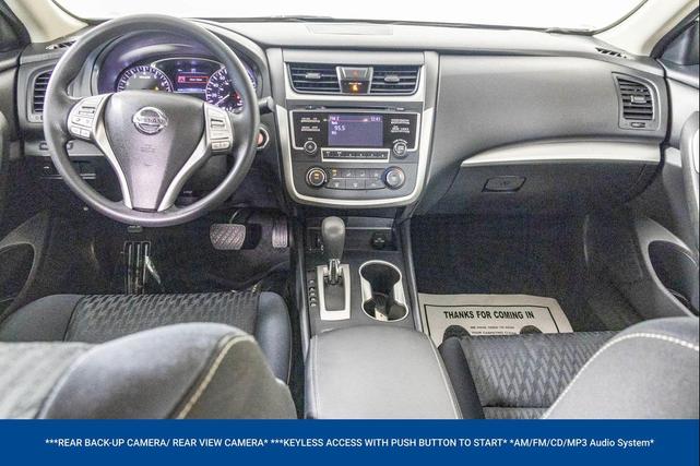 Photo of 2018 Glacier White Nissan Altima