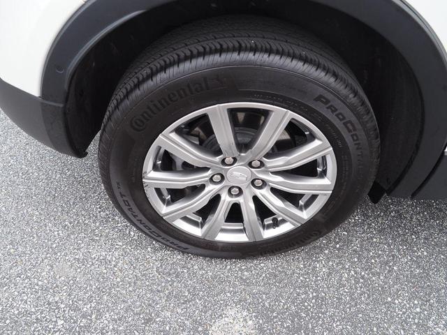 Photo of 2022 Crystal White Tri-Coat Cadillac XT4
