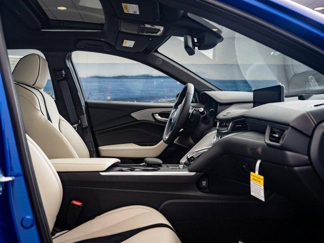 Photo of 2025 Apex Blue Pearl Acura TLX