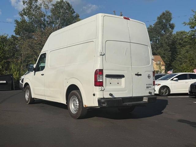 Photo of 2014 Glacier White Nissan NV Cargo NV2500 HD