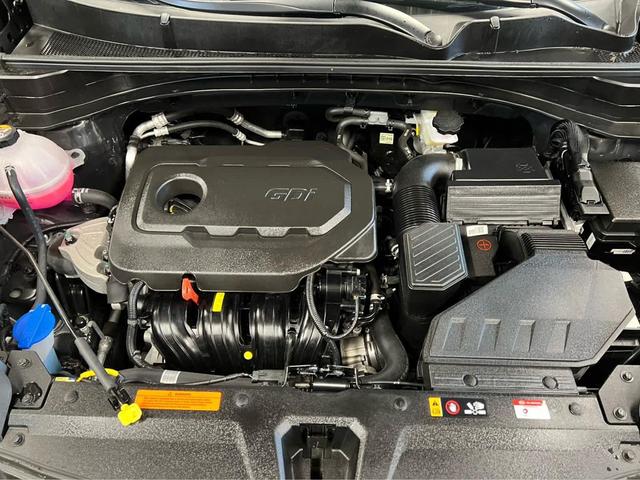 Photo of 2022 Black Cherry Kia Sportage