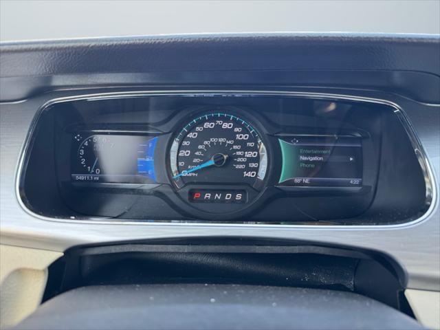 Photo of 2015 WHITE PLATINUM MET TRI-COAT Ford Taurus
