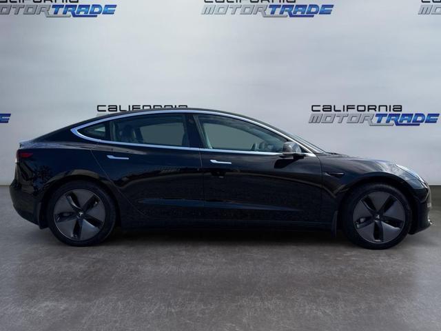 Photo of 2019 Solid Black Tesla Model 3