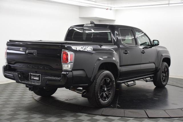 Photo of 2022 Midnight Black Metallic Toyota Tacoma