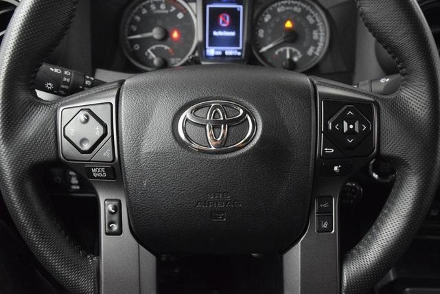 Photo of 2022 Midnight Black Metallic Toyota Tacoma