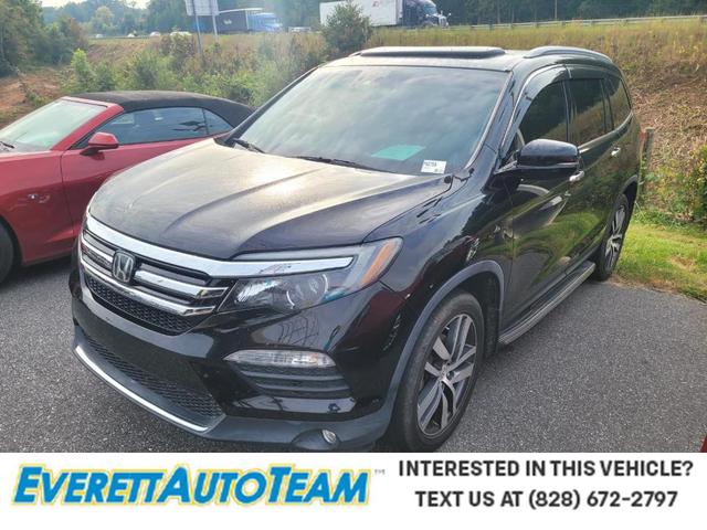 Photo of 2016 Crystal Black Pearl Honda Pilot