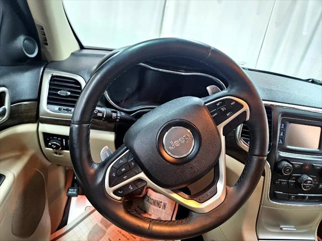 Photo of 2014 Deep Cherry Red Crystal Pearlcoat Jeep Grand Cherokee