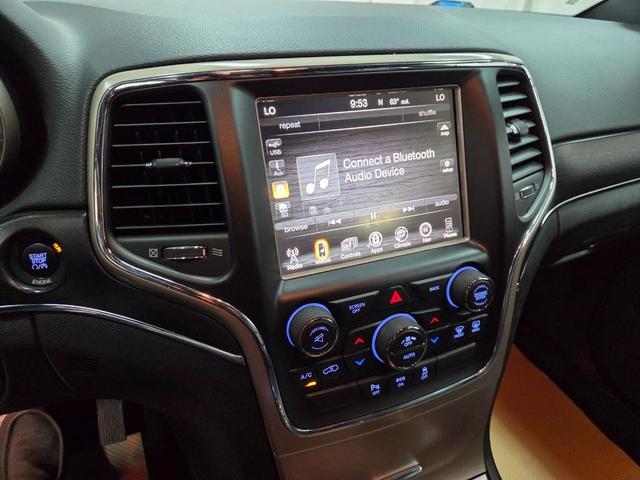 Photo of 2015 Bright White Clearcoat Jeep Grand Cherokee