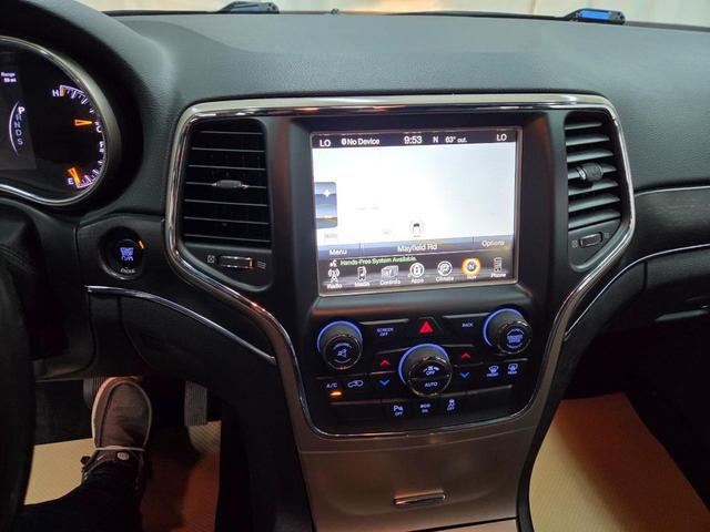 Photo of 2015 Bright White Clearcoat Jeep Grand Cherokee