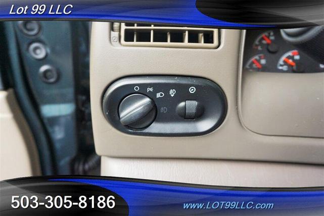 Photo of 2001 Dark Satin Green Clearcoat Metallic Ford Excursion