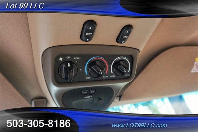 Photo of 2001 Dark Satin Green Clearcoat Metallic Ford Excursion