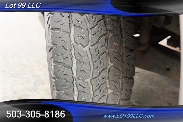 Photo of 2001 Dark Satin Green Clearcoat Metallic Ford Excursion