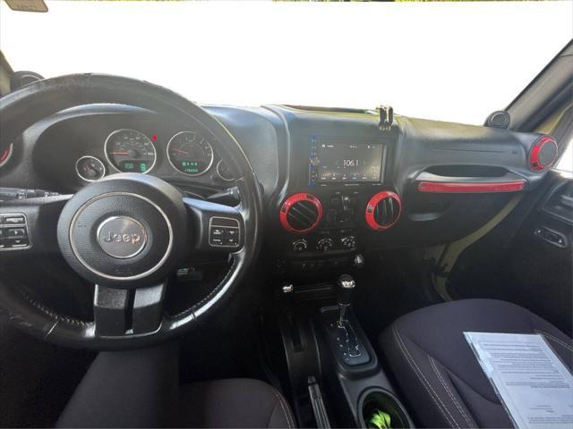 Photo of 2013 Commando Green Jeep Wrangler Unlimited