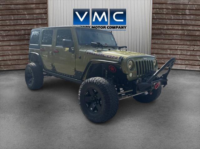 Photo of 2013 Commando Green Jeep Wrangler Unlimited