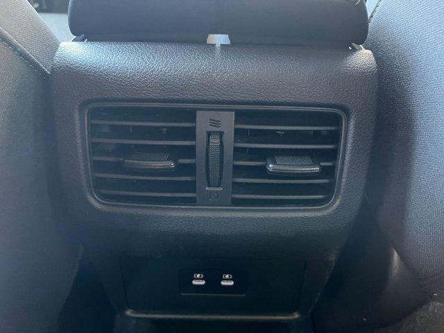 Photo of 2024 Super Black Nissan Rogue