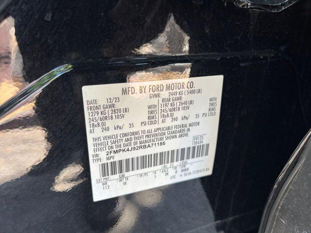 Photo of 2024 Agate Black Metallic Ford Edge