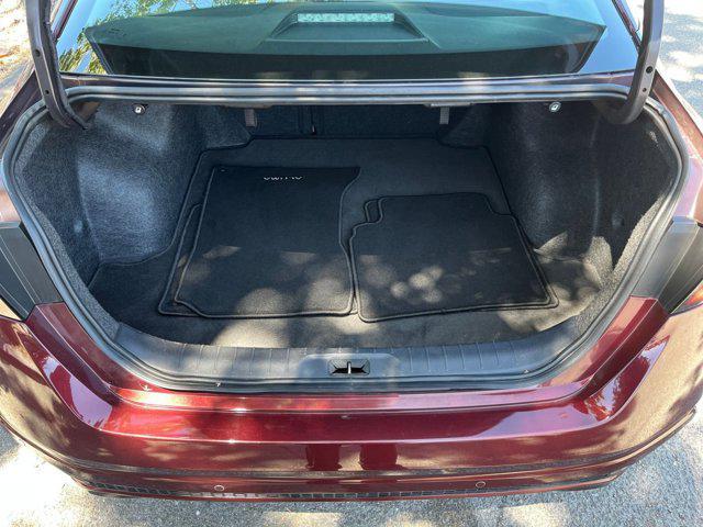 Photo of 2024 Garnet Pearl Metallic Nissan Altima